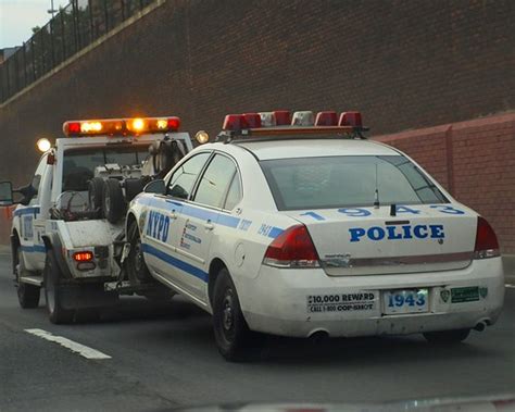Nypd Tow Truck Towing A Nypd Police Car Brooklyn Queens E Flickr