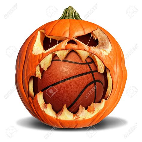 Basketball Autumn Concept As A Pumpkin Jack O Lantern Biting Into A