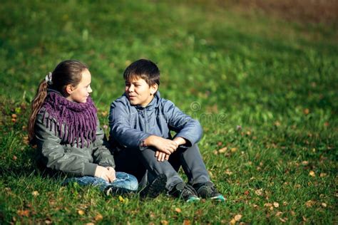 Couple Of Teenagers Romantically In The Park Stock Image Image Of