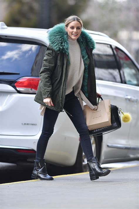 Olivia Palermo Wearing a Green Jacket and Black Boots ...