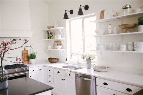 Decorating a white or gray kitchen with black appliances. White Kitchen Cabinets: 6 Versatile Designs and Styles You'll Love
