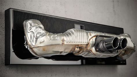 Porsches Dolby Atmos Soundbar Made From A Car Tailpipe Is A Look
