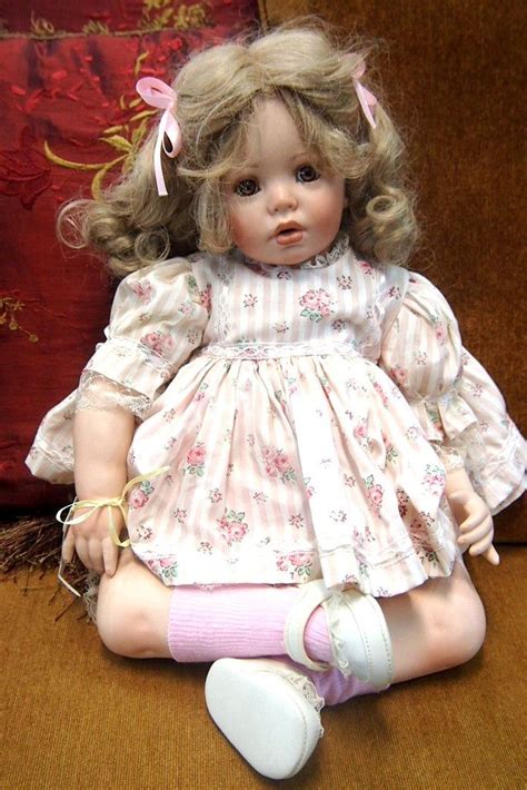 Doll Porcelain Hand Made Baby Doll With Blonde Hair Dressed In Pink