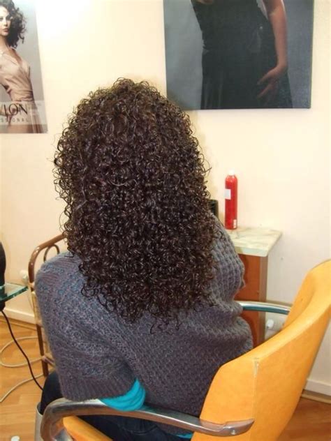 Generally, the perm rods can be differentiated by color, and the smaller the rod, the tighter the curl. Inspiration discovered by Heather Reichert | Spiral perm long hair, Permed hairstyles, Tight ...
