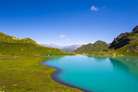 Premium Photo Alpine Mountain Lake At The Daytime Sunlight And