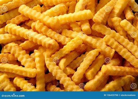 Close Up Background Of Crinkle Cut Fried Chips Stock Photo Image Of