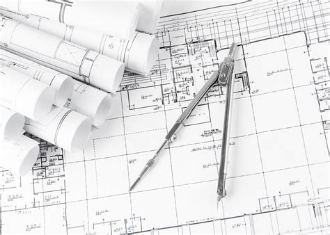 rolls of architecture blueprints and house plans - Signs Unlimited