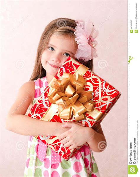 Smiling Adorable Little Girl With Christmas T Box Stock Image
