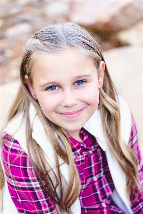 Portrait Of A Blue Eyed Girl With Long Blonde Hair By Stocksy Contributor Leigh Love Stocksy