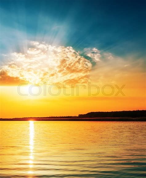 Bright Orange Sunset In Clouds Over Stock Image Colourbox