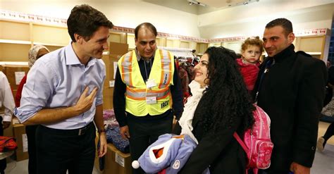 Syrian Refugees Greeted By Justin Trudeau In Canada The New York Times