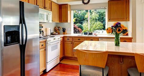 Rinse your cloth with warm water and give the cupboard. How to Remove Grease from Kitchen Cabinets