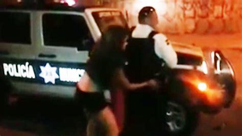 watch moment suspended police officer allows scantily dressed woman to frisk him in pretend