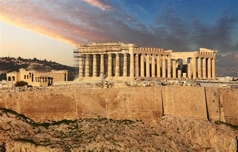 Acropolis Of Athens Greece With The Parthenon Temple During Sunset