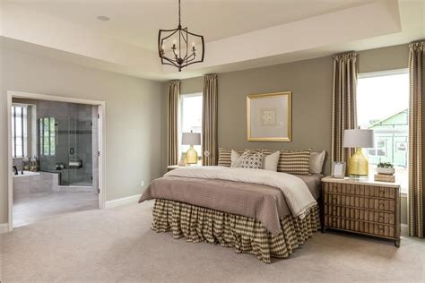What exactly is a double master house plan? This Master Bedroom is large and has double doors leading ...