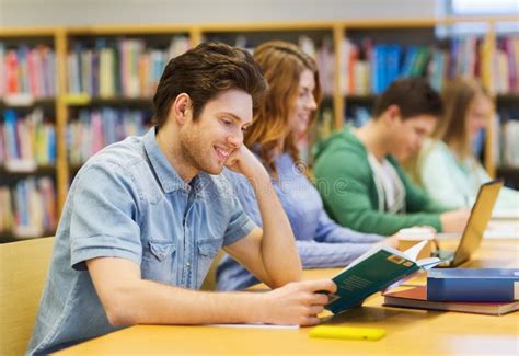 Happy Student Boy Reading Books In Library Stock Image Image Of