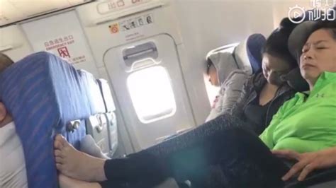 Plane Passenger Refuses To Remove Bare Feet From Tray