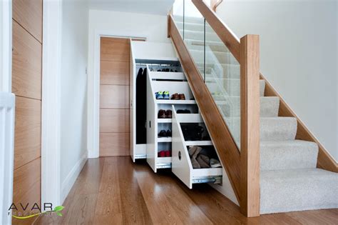 The emmental stairs was designed for a young creative family with an equisite design taste and an eye for details and their two children. Under stairs storage - Modern - Entrance - London - by Bespoke Fitted Furniture London | Avar ...