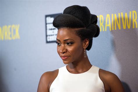teyonah parris shows off her first silk press and natural length