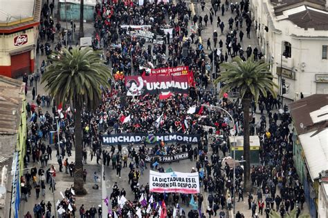 clashes arson mar chile march to commemorate pinochet victims