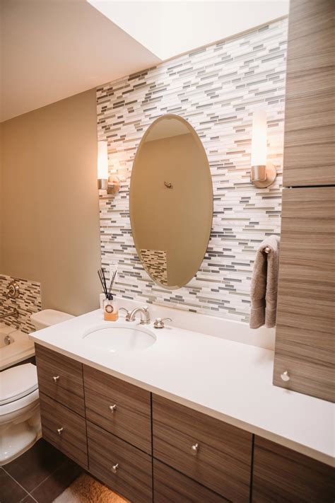 See how top designers create both timeless and trendy looks with marble, cement, ceramic, porcelain, faux wood and glass tile. Gorgeous Contemporary Bathroom With Glass Tile Accent Wall ...