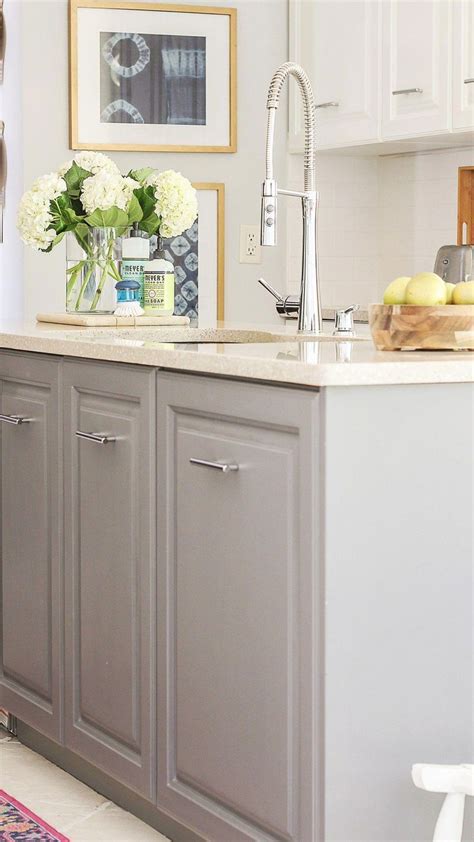 Now there's an easier way to paint kitchen cabinets, without destroying the heart of your home in the process. easiest way to paint kitchen cabinets #kitchenideas #diyproject #milkpaint #HomeImprovement #hom ...