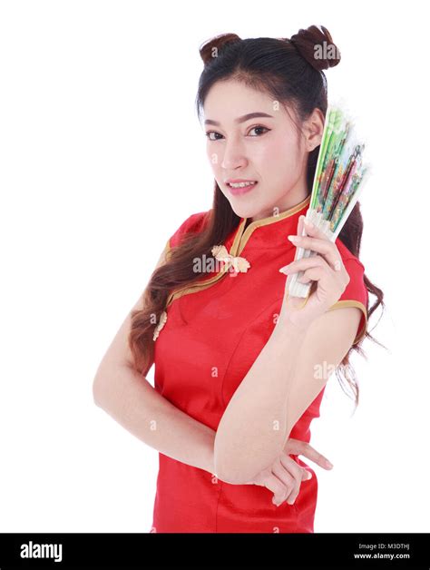 Woman Wearing Chinese Cheongsam Dress And Holding A Chinese Fan