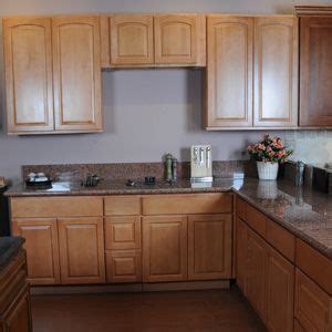 Stained shaker cabinets offer the ability to see the natural wood grains of the cabinet through the stain. honey spice maple kitchen cabinets | Cabinet, Solid wood kitchen cabinet, cabinet supp… | Solid ...