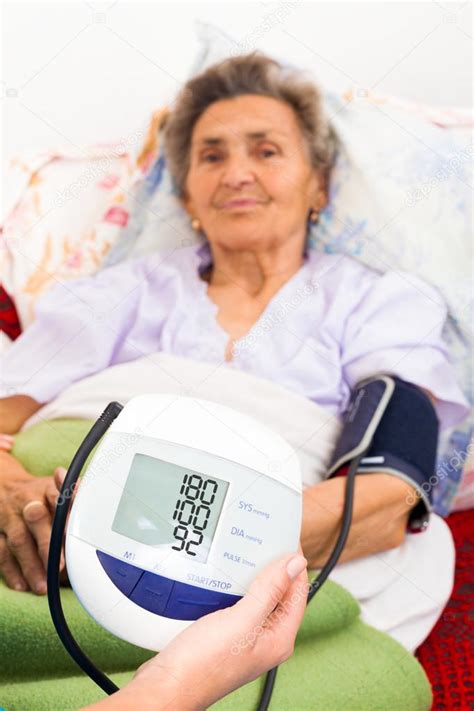 Nurse Helping To Measure Patients Blood Pressure — Stock Photo