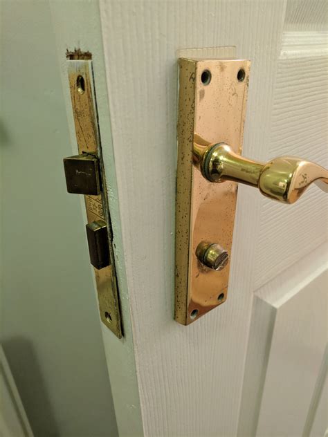 Use wood putty to fill the holes left behind. doors - How to remove this broken latch and handles ...