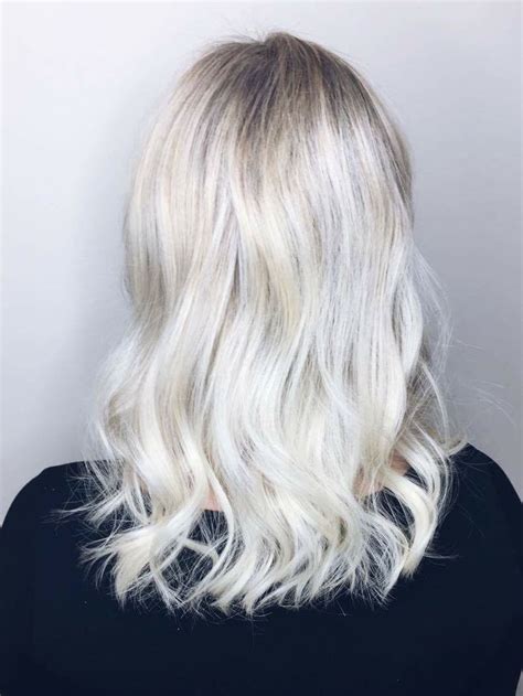 Rooty Blonde Platinum Hair Done With Aveda Colour And