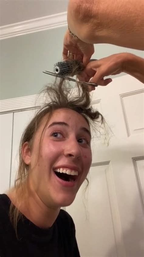 Woman Reacts Comically To Her Mom Chopping Off Her Entangled Hair In Roller Hairbrush Jukin