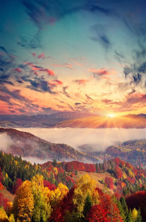 Colorful Autumn Sunset In Foggy Mountains Stock Photo Image Of