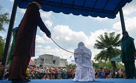 couples alleged sex workers whipped for breaking religious law in indonesia s aceh