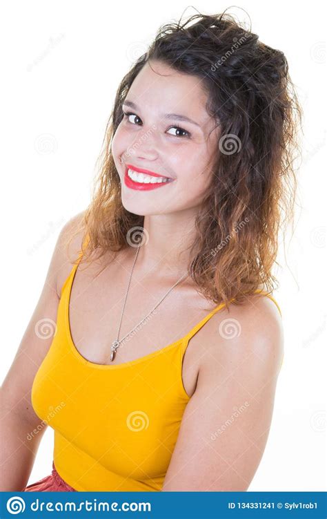 Beautiful Girl In Yellow Shirt Smiling And Happy Isolated Over White Background Stock Image