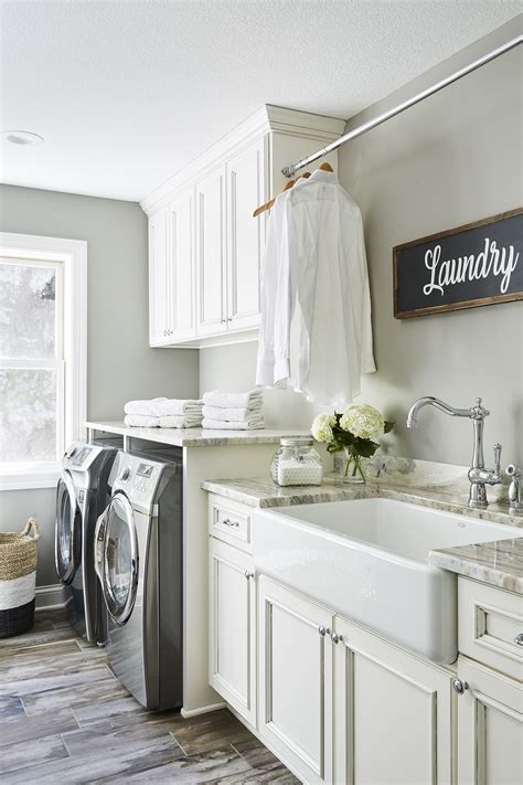The base cabinet must be 3 wider than the farmhouse sink. New Farmhouse-Style Laundry Room | Sneak Peek Design