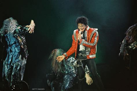 Michael Jackson Performs At Wembley Stadium During Bad World Tour July
