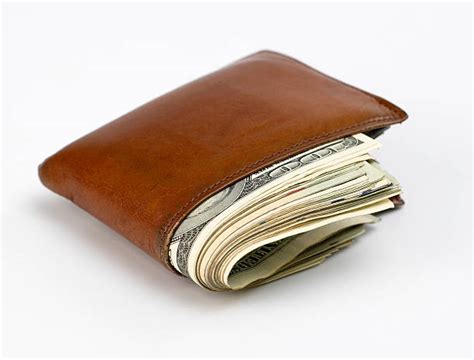 Wallet Full Of Money Stock Photos Pictures And Royalty Free Images Istock