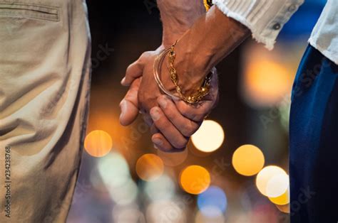 Couple Holding Hand At Night Stock Photo And Royalty Free Images On