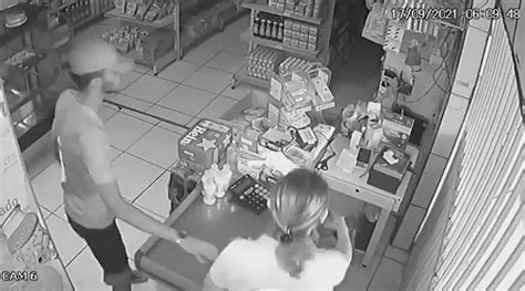 Moment Thief Politely Kisses Hand Of Cashier He Just Robbed