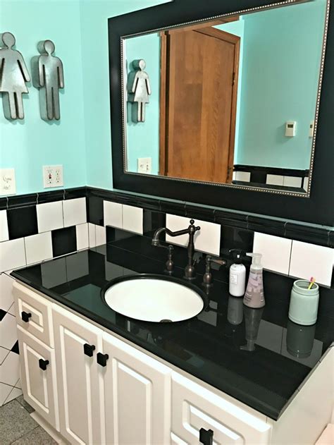 Amazing gallery of interior design and decorating ideas of brown and teal bathroom in bedrooms, decks/patios, girl's rooms, nurseries, bathrooms, kitchens, porches by elite interior designers. Retro Black White and Teal Bathroom Makeover on a Budget ...