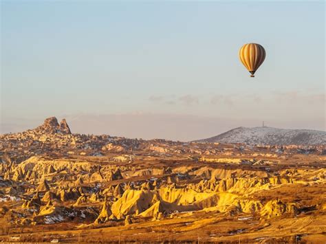 Premium Photo Hot Air Balloons Flying Over The Mountain In Cappadocia