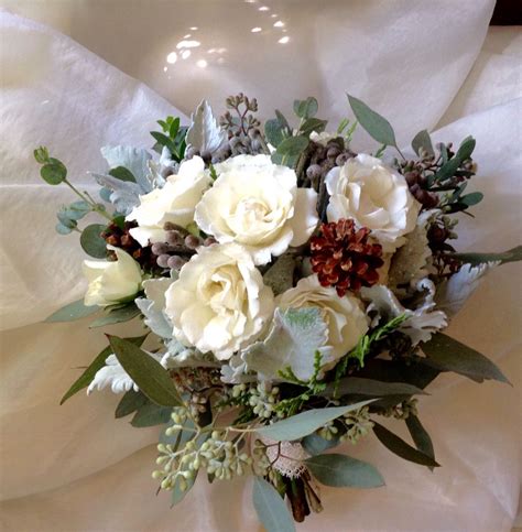 Winter Wedding Bouquet Of Spray Rosesbruniadusty Miller With Pine