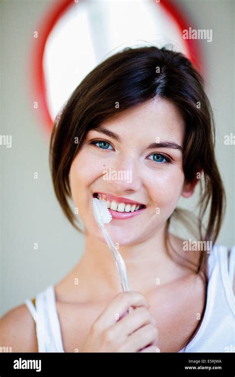 Woman Brushing Her Teeth Stock Photo Alamy
