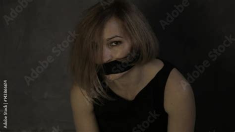 Stock Video Of Frightened Crying Girl Gagged Sitting On A Floor With Tied Hands Linen Bag On