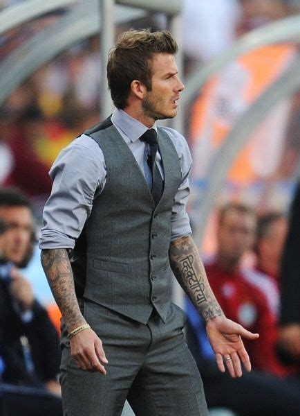 David Beckham In Vest David Beckham In Gray Trouses And Gray Vest