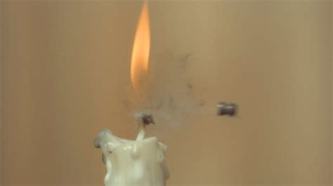 The Burning Wick Of A Candle Shot Out With An Air Pistol In 28000 Fps