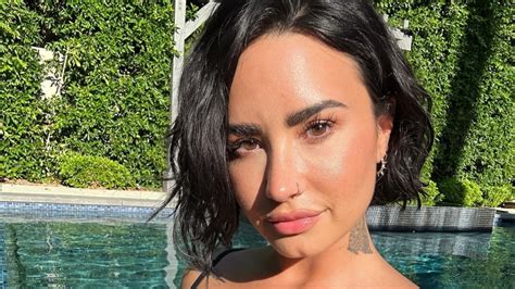 Demi Lovato Stuns In Plunging Bikini From Her Bathroom