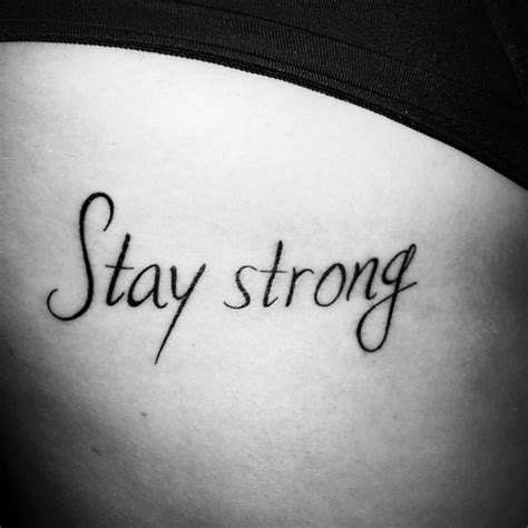 Side Tattoo Saying Stay Strong On Lyneke