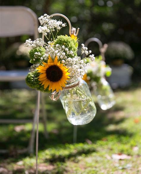 Check spelling or type a new query. Simple but beautiful ceremony flowers lining the walkway ...